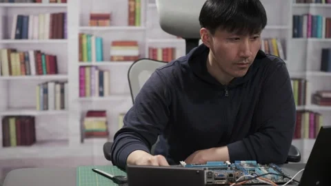 Hardware engineer programming new technology for artificial intelligence Stock Footage 295394930