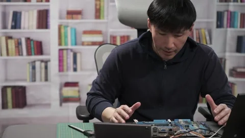 Hardware engineer programming new technology for artificial intelligence Stock Footage 295394954