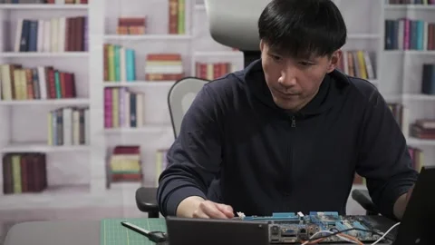 Hardware engineer programming new technology for artificial intelligence Stock Footage 295394955