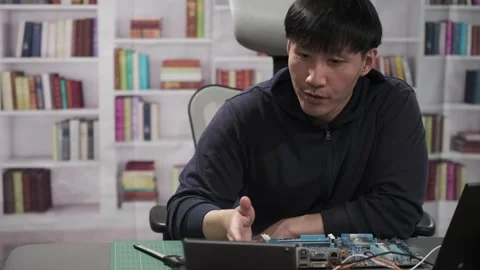 Hardware engineer programming new technology for artificial intelligence Stock Footage 295394958