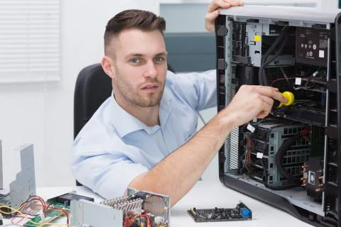 Hardware professional examining cpu with stethoscope Stock Photos