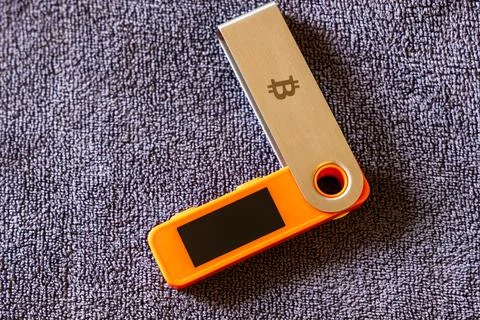 Hardware security device lying flat on textured surface indoors Stock Photos