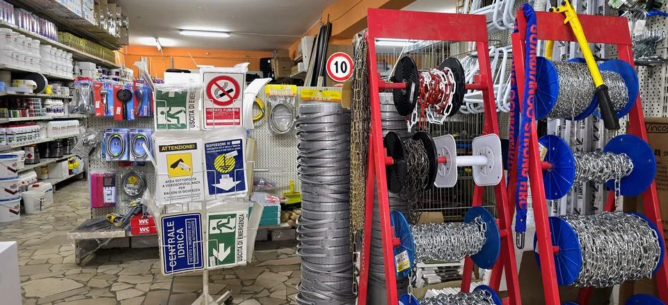 Hardware Store Display of Chains and Safety Signs Stock Photos