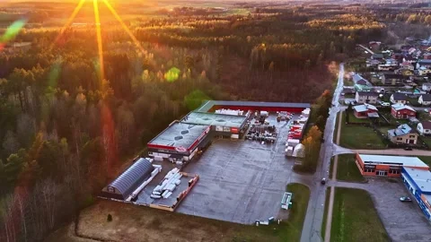 Hardware store Kurši warehouse and logistics center near a small town during a Stock Footage 335894416