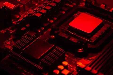 Hardware technology concept in red light. Motherboard in red light. Computer  Stock Photos