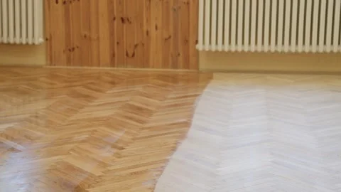 Hardwood floor restoration process in large public building area Video stock 326420792