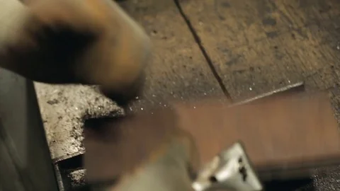Hardwood Flooring Workshop - Scraping off the Old Tar Stock Footage 70304641