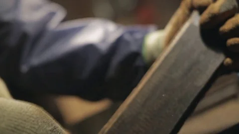 Hardwood Flooring Workshop - Scraping off the Old Tar Stock Footage 70304751