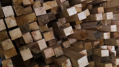 Hardwood pine timber of square section lying on the shelf. Natural, organic, ren Stock Footage 82230630