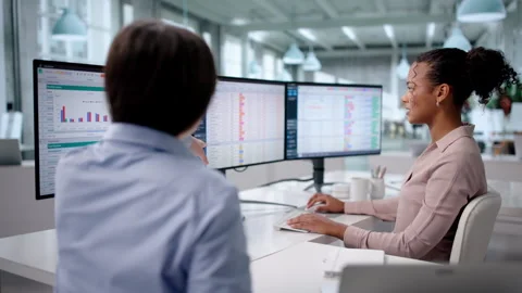 Hardworking Chartered Analysts Managing Spreadsheet Data Stock Footage 328714159