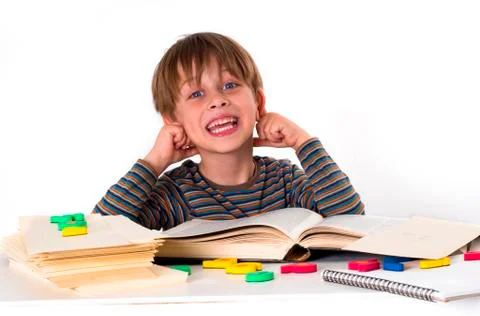 Hardworking schoolboy Stock Photos