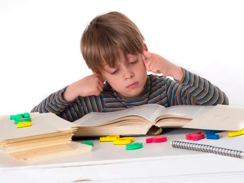 Hardworking schoolboy Stock Photos