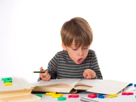 Hardworking schoolboy Stock Photos