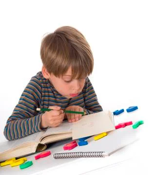 Hardworking schoolboy Stock Photos