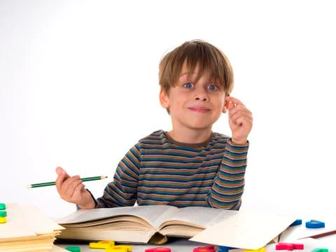 Hardworking schoolboy Stock Photos
