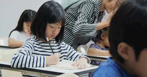 Hardworking student studies for a class in her school. Stock Footage 111404440