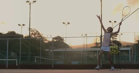 Hardworking tennis player practising her serve Stock Footage 85651480