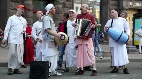 Hare Krishna devotees playing musical instruments, dancing and singing Stock Footage 47911594