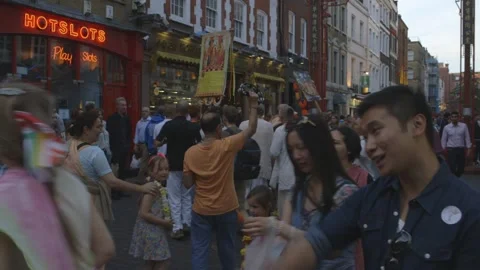 HARE KRISHNA GROUP DANCING AND SINGING IN LONDON CHINA TOWN Stock Footage 130745166