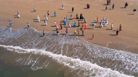 Hare Krishna group on Juhu beach in Mumbai, India, 4k aerial drone footage Stock-Footage 107937846