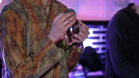 Hare Krishna man Playing Traditional Indian Instrument jingle Close-up. Stock Footage 103985222