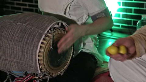 Hare Krishna Man Playing Traditional Indian Instrument Mridanga Close-up. Stock Footage 103985290