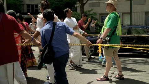Hare Krishna parade - worshippers pulling rope of float New York City NYC Stock Footage 112078135