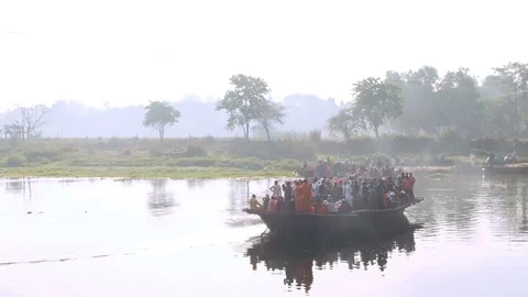 Hare Krishna pilgrims procession in a boat, Mayapur, India, 4k aerial Stock Footage 109296319