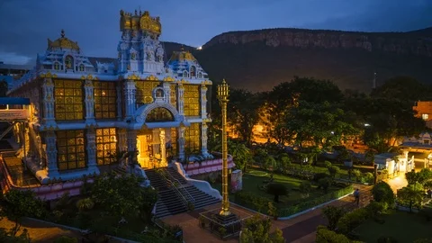 Hare Krishna temple in Tirupati with view to Tirumala time lapse 4k Stock Footage 83753157