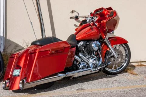 Harley Davidson Old motorcycle, solid red tone, monochrome. Stock Photos