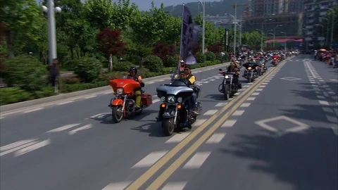 Harley Davidson riders riding on road during fifth National Rally Stock Footage 88727853