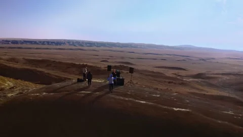 Harmonic Heights: DJ Music Session Atop Georgian Mountain Stock Footage 280690898
