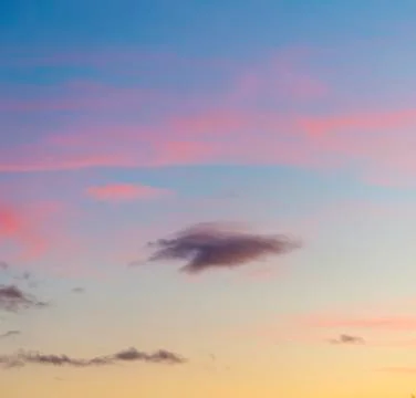 Harmonic pattern of blue and red sky in sunset Stock Photos