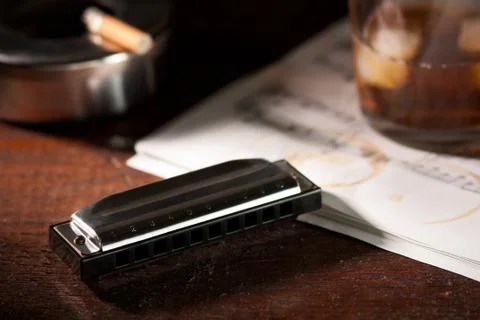Harmonica with Whiskey and Cigarette Stock Photos