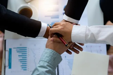 Harmonious and team concept,close up hand of office colleague put together Stock Photos