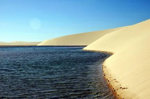 Harmonious Encounter between Dunes and Lagoon in Lenis Maranhenses Stock Photos