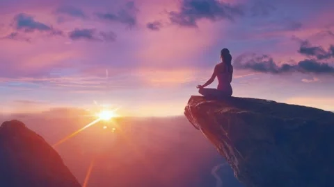 Harmonious Meditation on the Rocks among the Clouds. Loop video, 4K. Stock Footage
