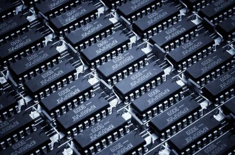 Harmonous numbers of the obsolete microcircuits. Technology background Stock Photos