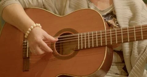 Harmony with the rhythmic beats of the guitar Stock Photos