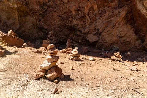 Harmony in Stone: a Towering Stack Against the Cliff Stock Photos
