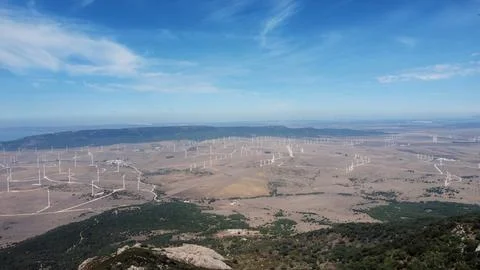 Harnessing the Power of Wind: A Panoramic View of Tarifa's Wind Farm Stock Photos