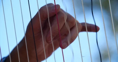 Harp chord vibration Stock Footage 126592645