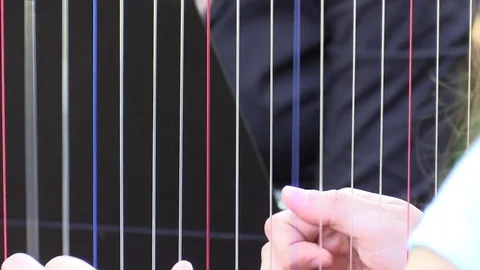 Harpist that play Stock Footage 76873856