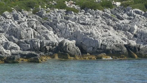 Harsh Cliffs along Shore Stock Footage 77356542