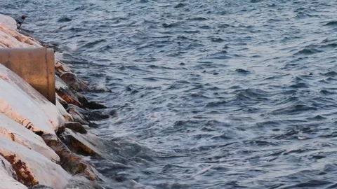 Harsh waves hitting to seaside walls Stock Footage 102783576