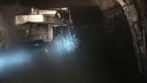 Harvester for coal extraction is crushes the wall, carbon's dust Stock Footage 73661161