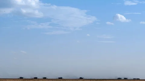 Harvester machine to harvest wheat field working. Combine harvester agriculture Stock Footage 75069842
