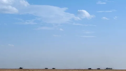 Harvester machine to harvest wheat field working. Combine harvester agriculture Video stock 75069967
