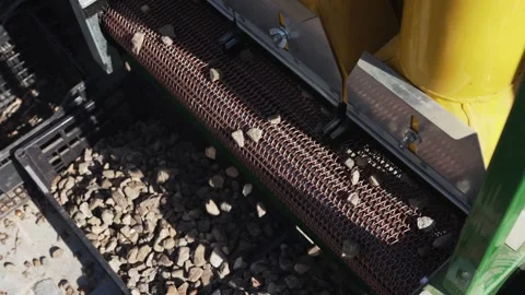 Harvester separator machine separate the hazelnuts crop from stones and rocks Stock Footage 259755541