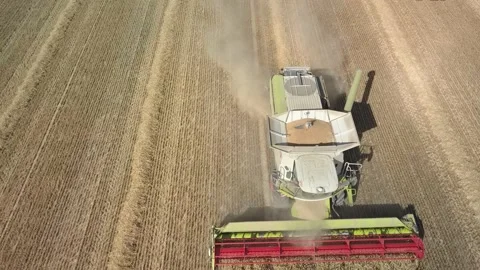 Harvester from top loading tractor drone 1 Stock Footage 168288176